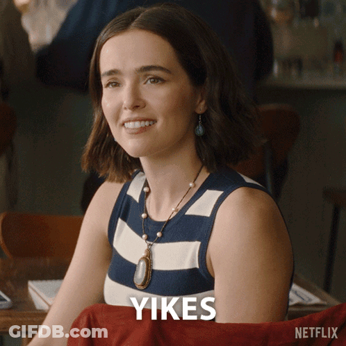 Woman At Table Saying Yikes GIF