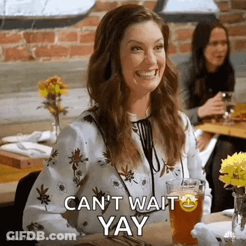Woman At Table With Beer And Smiley Face GIF