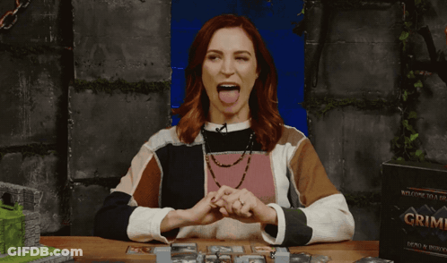 Woman At Table With Box Of Grime GIF