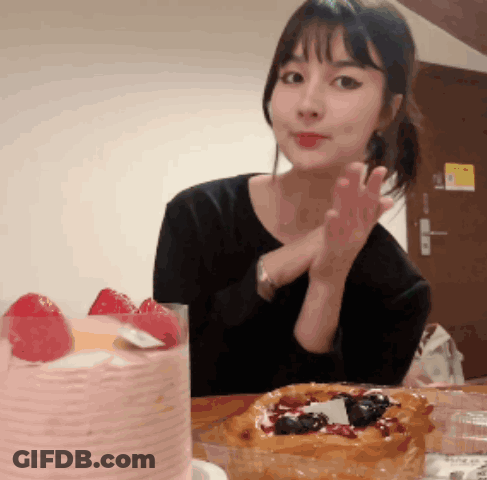Woman At Table With Cake And Pastry GIF