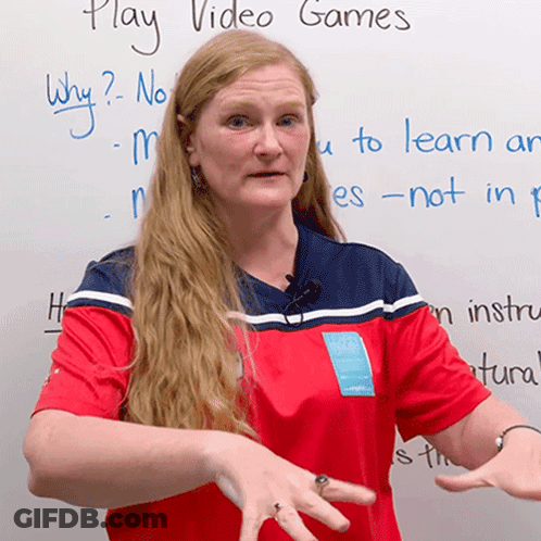 Woman At White Board Saying Play Video Games GIF