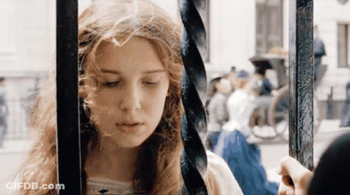 Woman Behind Bars Eyes Closed Man Holding Her Hand GIF