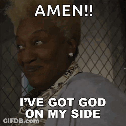 Woman Behind Chain Link Fence Smiling Says Amen I've Got God On My Side GIF