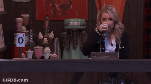 Woman Behind Counter With O Sign GIF