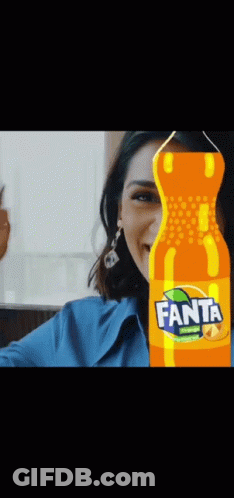 Woman Behind Fanta Orange Soda GIF