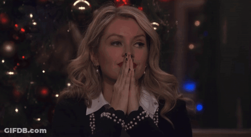 Woman Behind Sign Saying Britney GIF