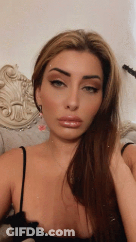 Woman Black Top Selfie Hand In Hair GIF