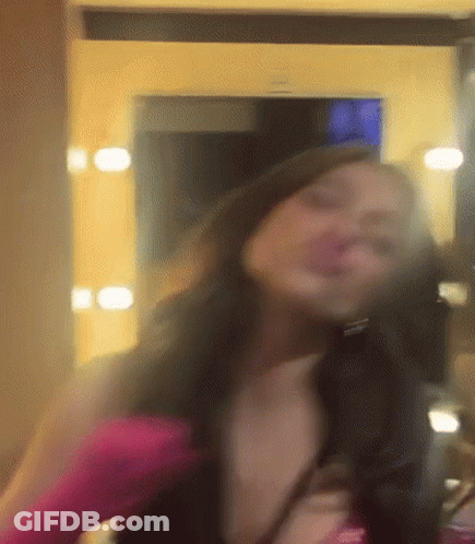 Woman Blow Drying Hair In Mirror GIF