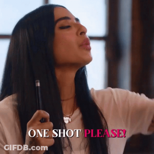 Woman Blowing Kiss Holding E-Cigarette Saying One Shot Please GIF