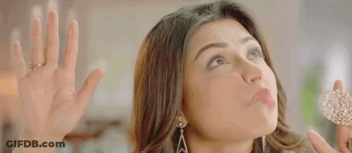 Woman Blowing Kiss Holding Flower Looking Up GIF