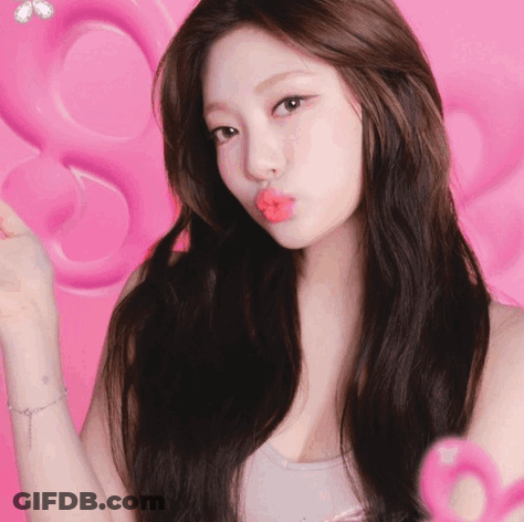 Woman Blowing Kiss With Pink Heart GIF