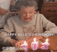 Woman Blowing Out Birthday Cake Candles GIF