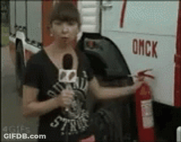 Woman Blown Away By Fire Extinguisher GIF