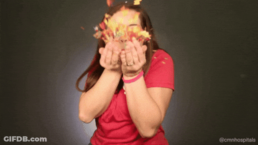 Woman Blows Glitter Bomb Of Maple Leaf GIF