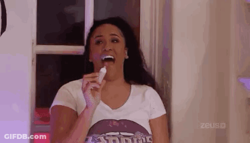 Woman Brushing Teeth In White Shirt GIF