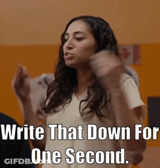Woman By Sign Saying Write That Down For One Second GIF