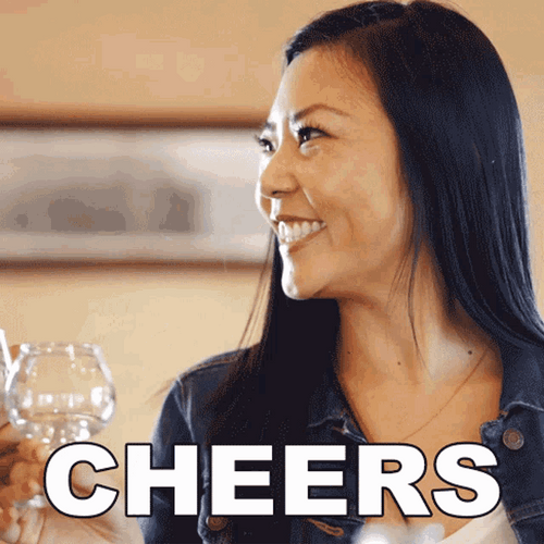 Woman Cheers And Smiling GIF