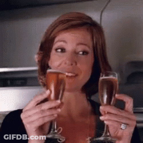 Woman Cheers For Prosecco Glass GIF