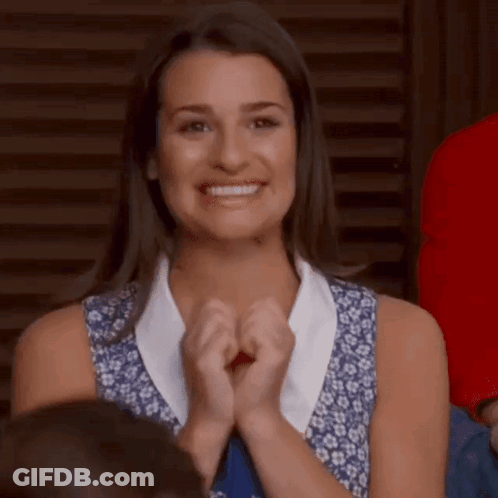 Woman Clapping And Smiling In Crowd GIF