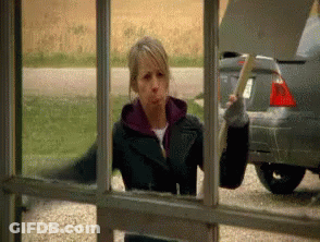Woman Cleaning Window With Axe GIF