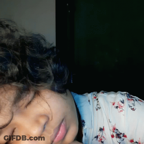 Woman Close Up In Floral Shirt GIF