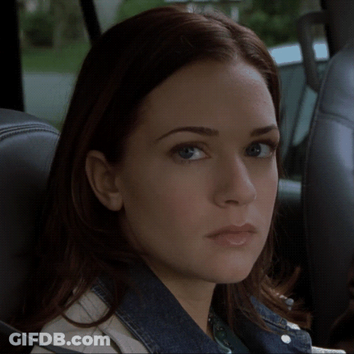 Woman Close Up Looking At Camera GIF