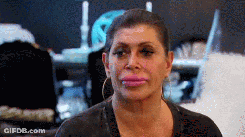 Woman Close Up Pink Lips And Earrings GIF