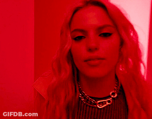 Woman Close Up Red Background GIF