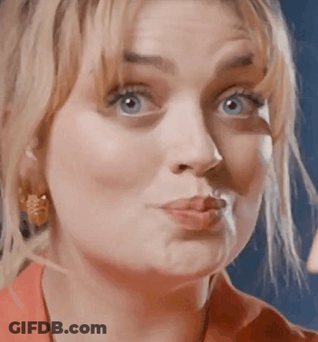 Woman Close Up With Blue Eyes GIF