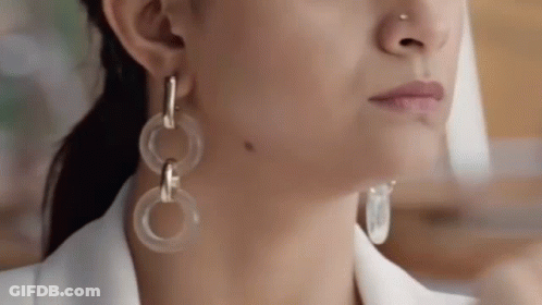 Woman Close Up With Earrings GIF