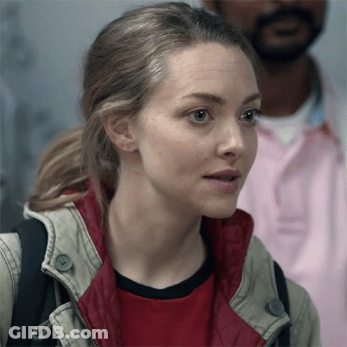 Woman Close Up With Man In Pink Shirt Background GIF