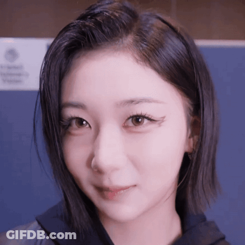 Woman Close Up With No Smoking Sign GIF