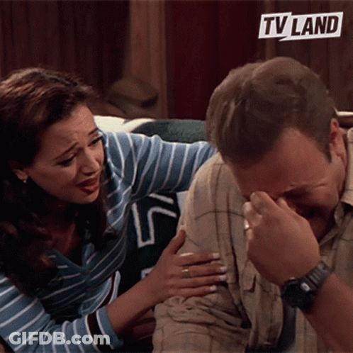Woman Comforting Man Covering Face GIF