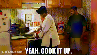 Woman Cooking In Kitchen Man Saying Yeah Cook It Up GIF
