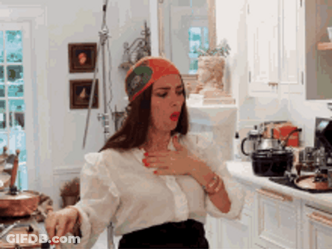 Woman Coughing And Holding Chest GIF