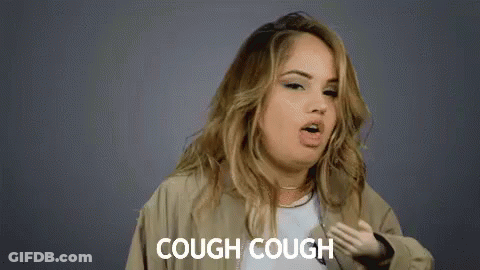 Woman Coughing With Hand On Chest Saying Cough Cough GIF