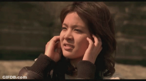 Woman Covering Ears GIF