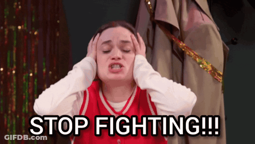 Woman Covering Ears Saying Stop Fighting GIF