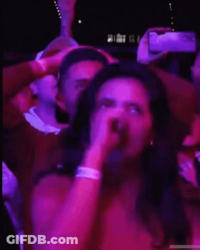 Woman Covering Eyes While Man Photographs GIF