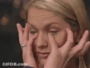Woman Covering Eyes With Hands GIF
