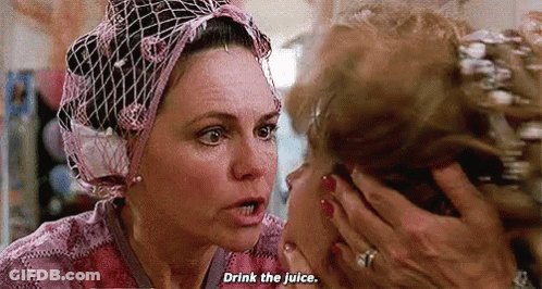 Woman Covering Face Saying Drink The Juice GIF