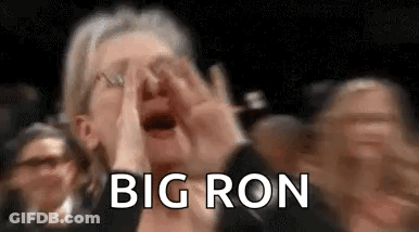 Woman Covering Face While Crowd Applauds GIF