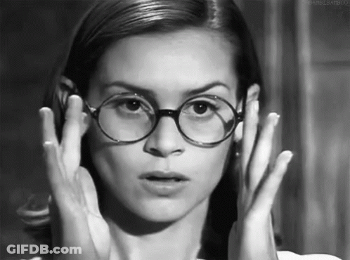 Woman Covering Face With Glasses GIF