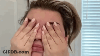 Woman Covering Face With Hands GIF