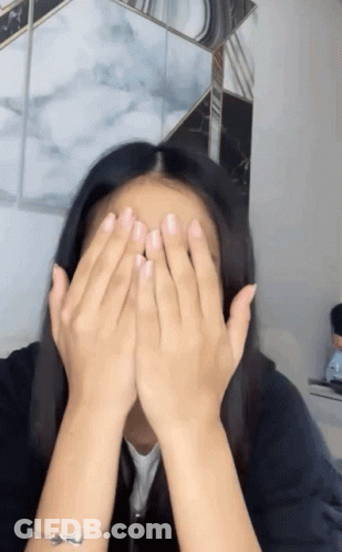 Woman Covering Face With Hands Wearing Bracelet GIF