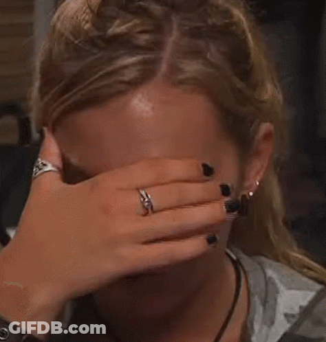 Woman Covering Face With Ring GIF