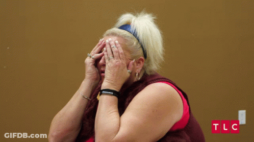 Woman Covering Face With TLC Logo GIF