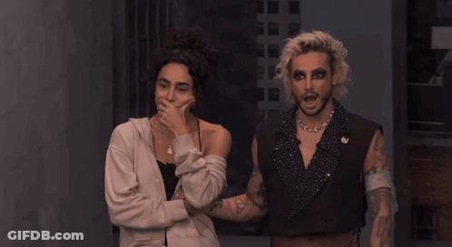 Woman Covering Mouth Beside Man GIF