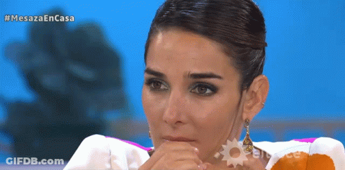 Woman Covering Mouth In Front Of Mesaza En Casa Screen GIF