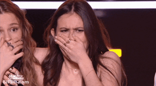 Woman Covering Mouth In Front Of Star Academy Sign GIF
